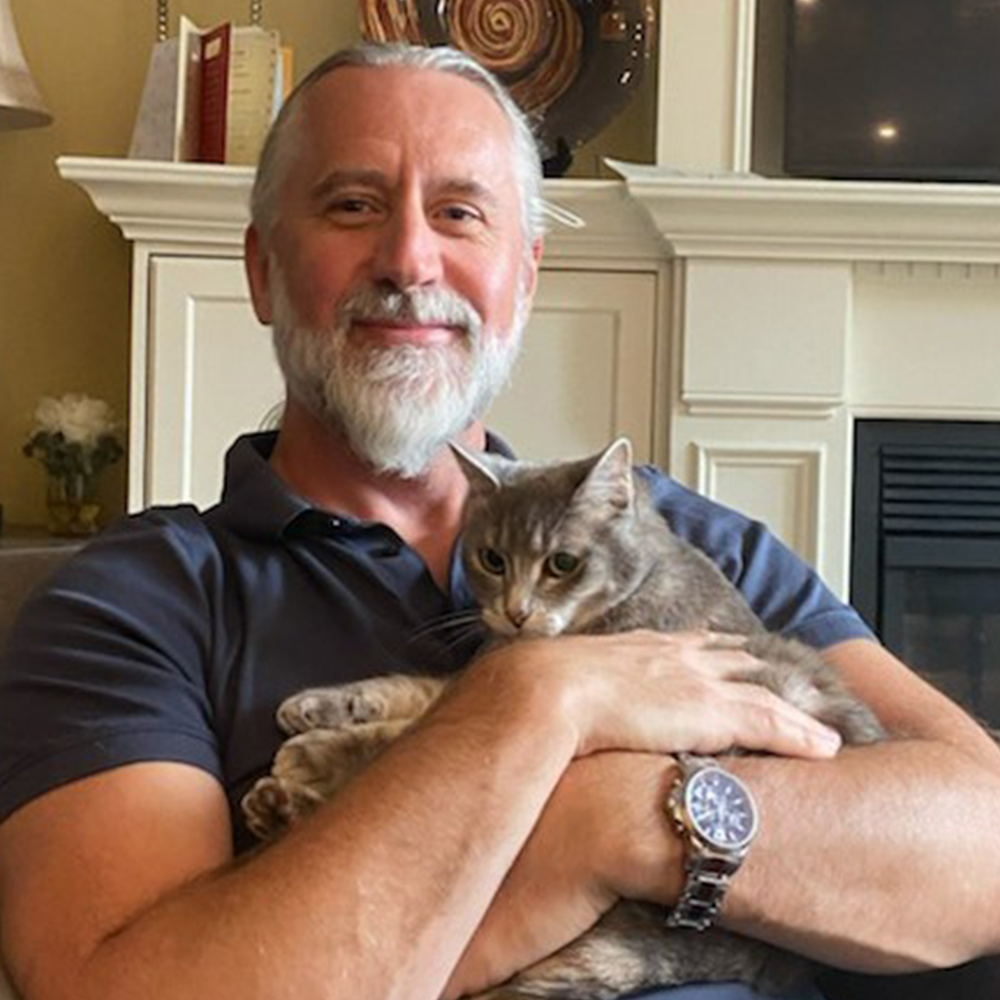 Randy Wood and his cat.