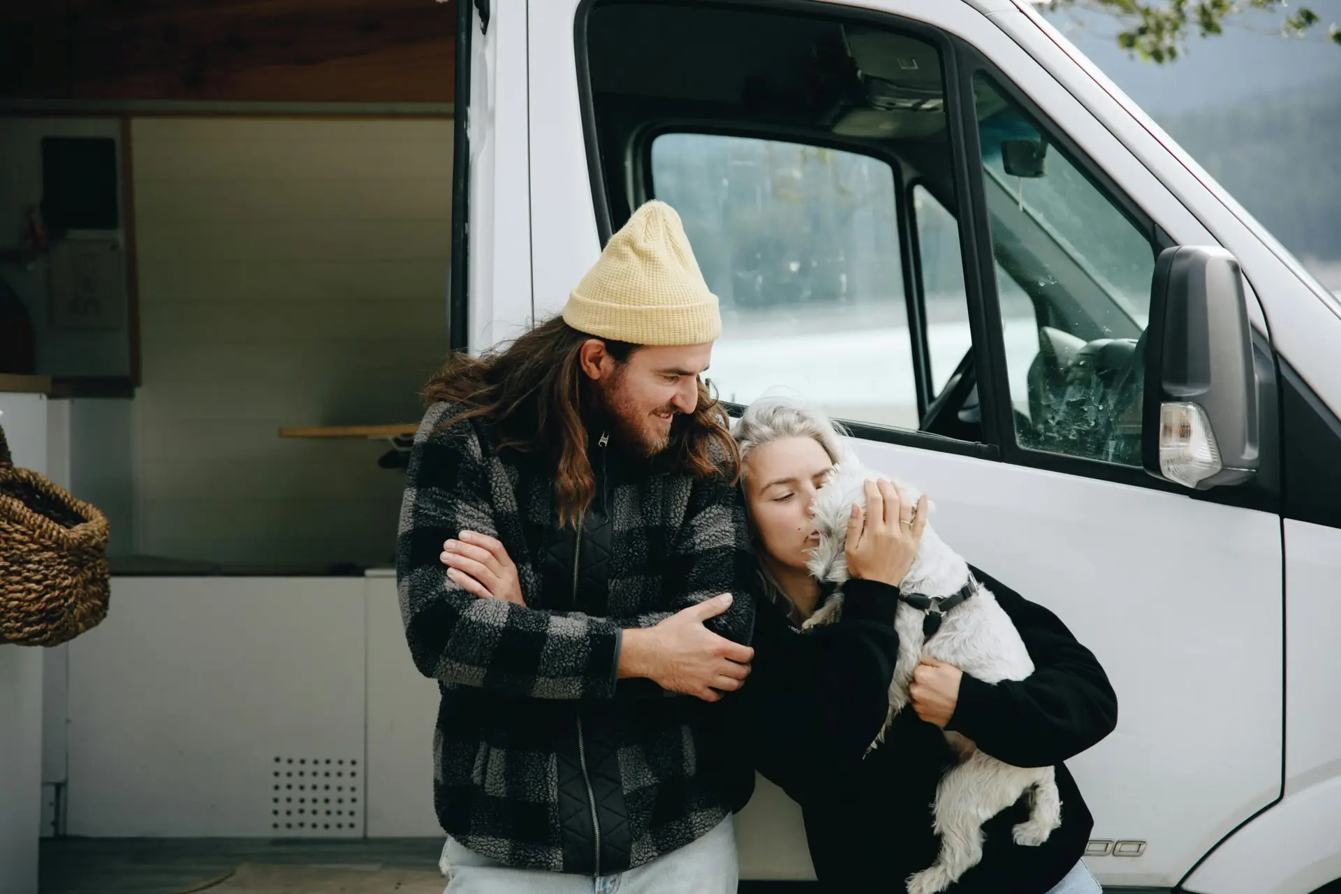 Mobile vet truck with two people and a dog